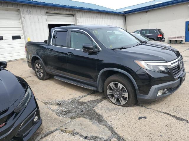 Photo 4 from auction – 2017 HONDA RIDGELINE RTL with VIN 5FPYK3F67HB035147