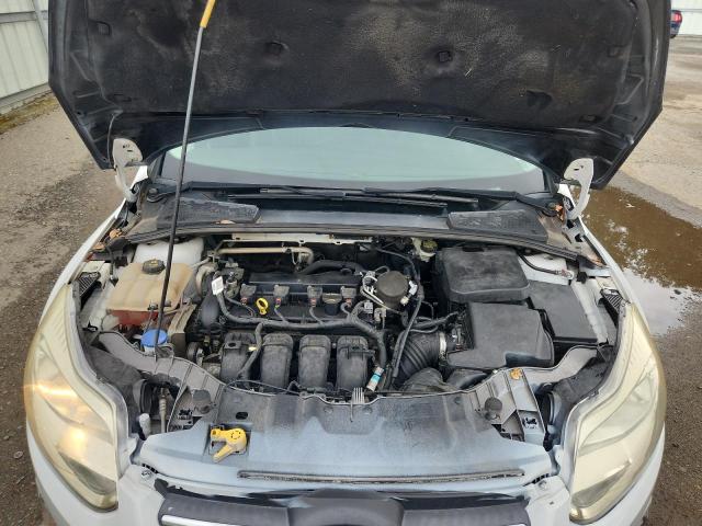 Photo 11 from auction – 2014 FORD FOCUS SE with VIN 1FADP3F22EL231324