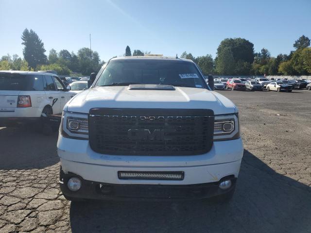 Photo 5 from auction – 2012 GMC SIERRA K25 with VIN 1GT125E87CF196188