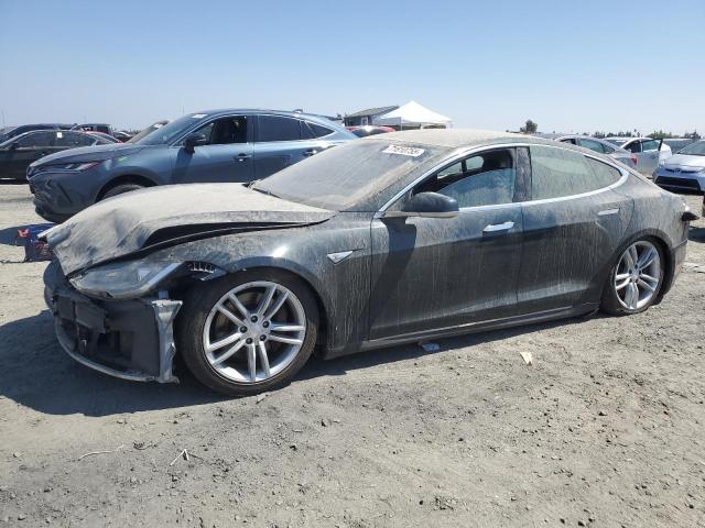 TESLA MODEL S 2012 with VIN 5YJSA1CN0CFP02571 - Photo from auction