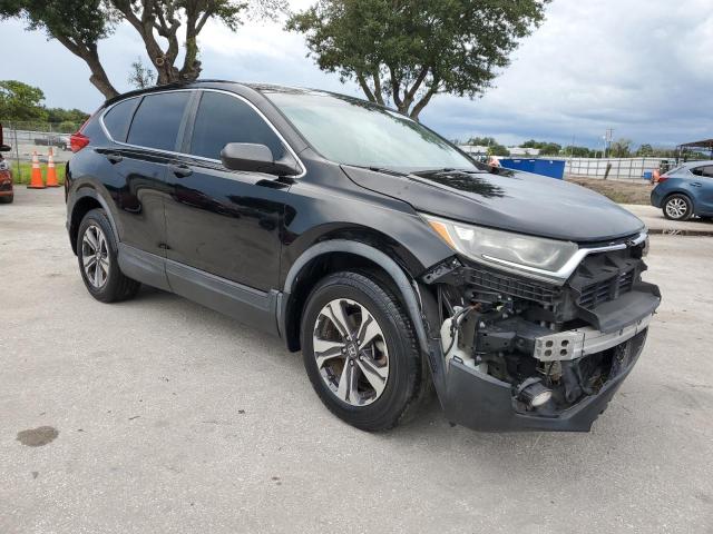 Photo 4 from auction – 2017 HONDA CR-V LX with VIN 7FARW5H32HE008507