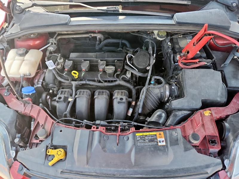 Photo 11 from auction – 2014 FORD FOCUS TITA with VIN 1FADP3J28EL229388