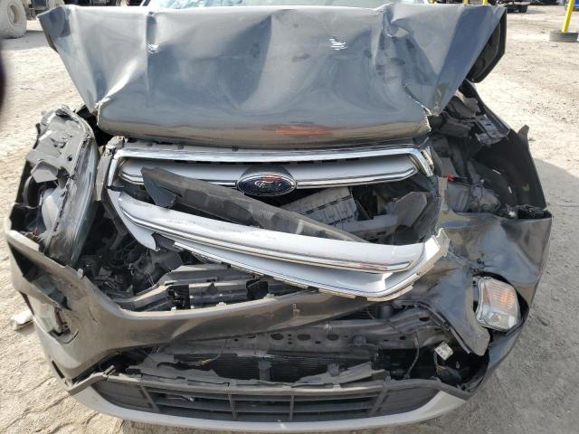 Photo 12 from auction – 2017 FORD ESCAPE SE with VIN 1FMCU0GD3HUD18477