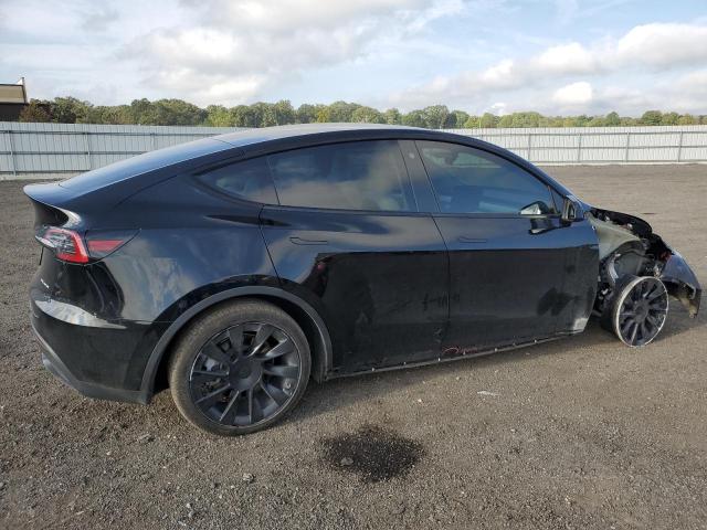 Photo 3 from auction – 2023 TESLA MODEL Y with VIN 7SAYGDEE2PF780477