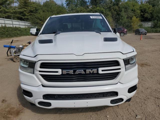 Photo 5 from auction – 2023 RAM 1500 LARAM with VIN 1C6SRFJTXPN666698