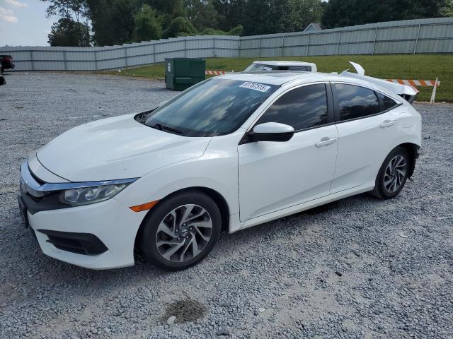 HONDA CIVIC EX 2018 with VIN 2HGFC2F74JH513851 - Photo from auction