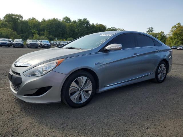 HYUNDAI SONATA HYB 2015 with VIN KMHEC4A49FA119587 - Photo from auction