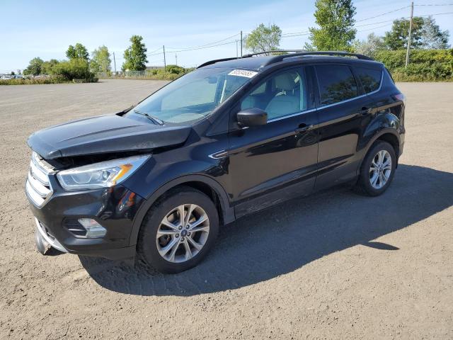 FORD ESCAPE SEL 2018 with VIN 1FMCU9H91JUC96838 - Photo from auction