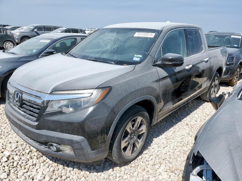 HONDA RIDGELINE 2017 with VIN 5FPYK2F69HB004699 - Photo from auction
