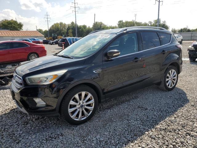 FORD ESCAPE TIT 2017 with VIN 1FMCU0JD9HUD06925 - Photo from auction