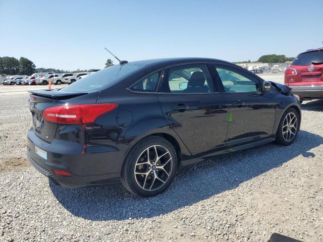 Photo 3 from auction – 2016 FORD FOCUS SE with VIN 1FADP3F24GL402934