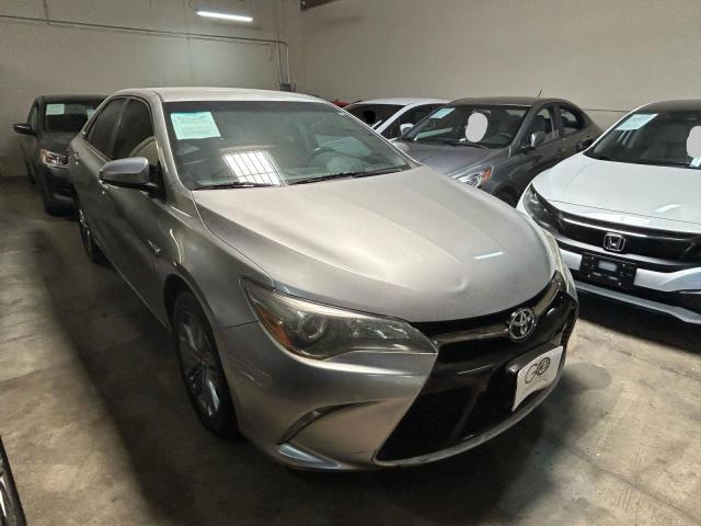 TOYT CAMRY LE 2015 with VIN 4T1BF1FK9FU946424 - Photo from auction