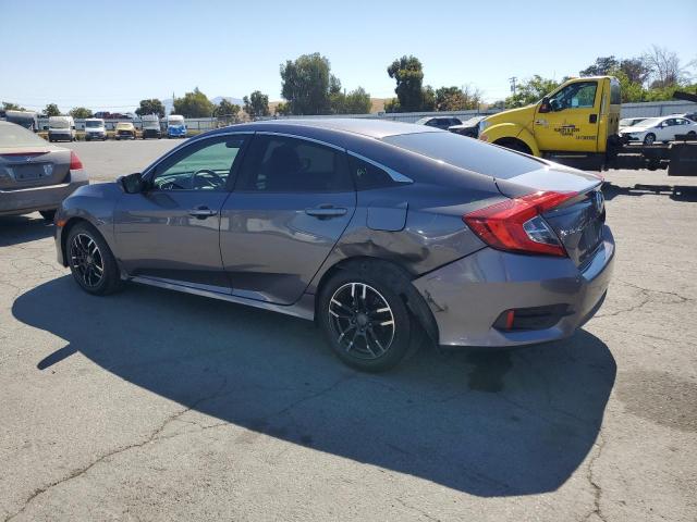 Photo 2 from auction – 2016 HONDA CIVIC LX with VIN 19XFC2F52GE212934