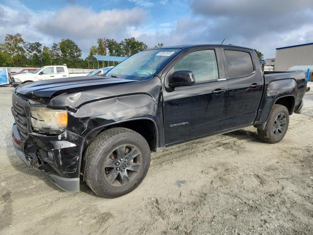 GMC CANYON SLE 2015 with VIN 1GTG5BEA7F1211440 - Photo from auction