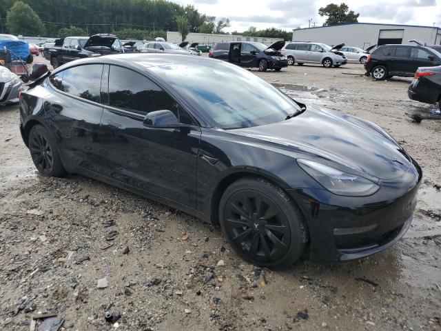 Photo 4 from auction – 2023 TESLA MODEL 3 with VIN 5YJ3E1EB9PF711402