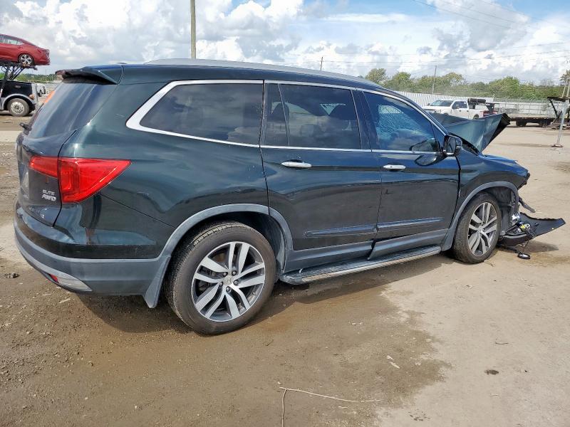 Photo 3 from auction – 2016 HONDA PILOT ELIT with VIN 5FNYF6H03GB017928