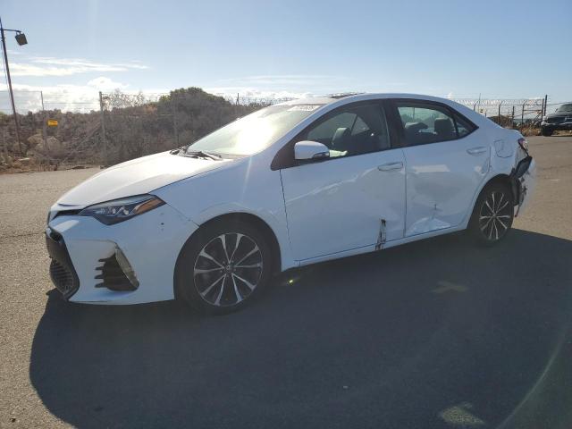 TOYOTA COROLLA L 2017 with VIN 2T1BURHE2HC778576 - Photo from auction