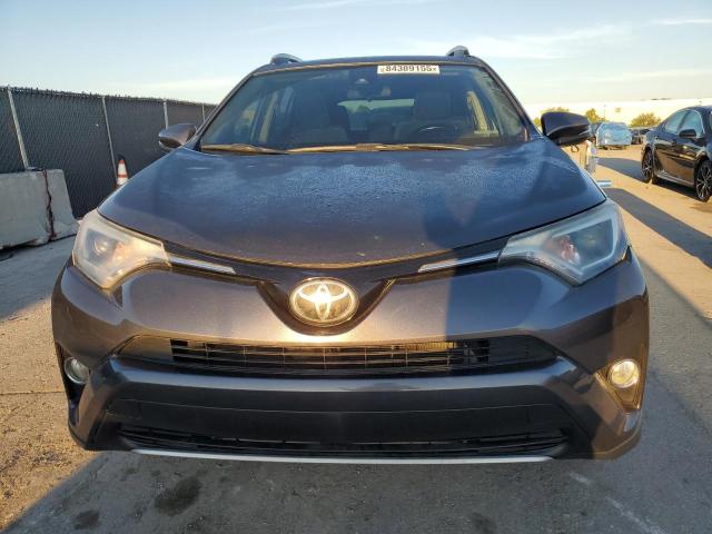 Photo 5 from auction – 2017 TOYOTA RAV4 XLE with VIN JTMWFREV4HJ133433