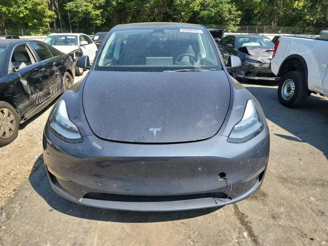 Photo 5 from auction – 2023 TESLA MODEL Y with VIN 7SAYGDEE9PA054581