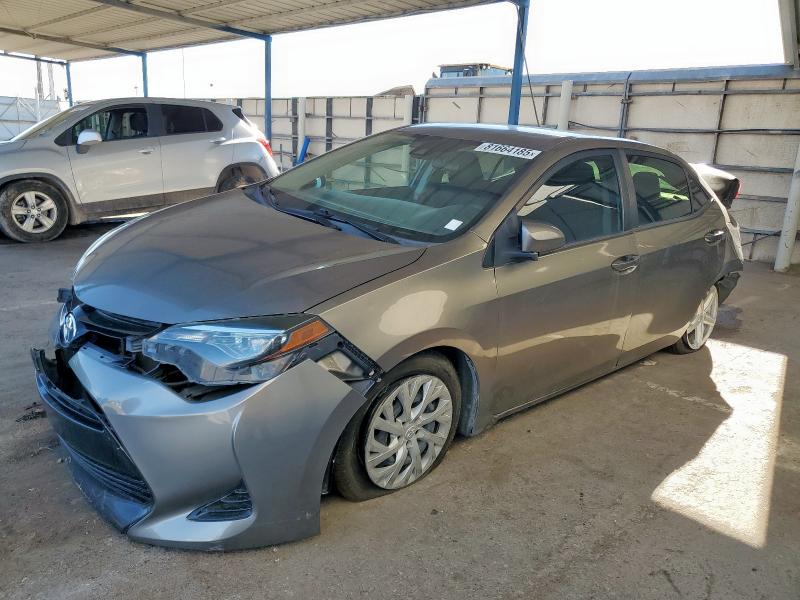 TOYOTA COROLLA L 2019 with VIN 5YFBURHE1KP869684 - Photo from auction
