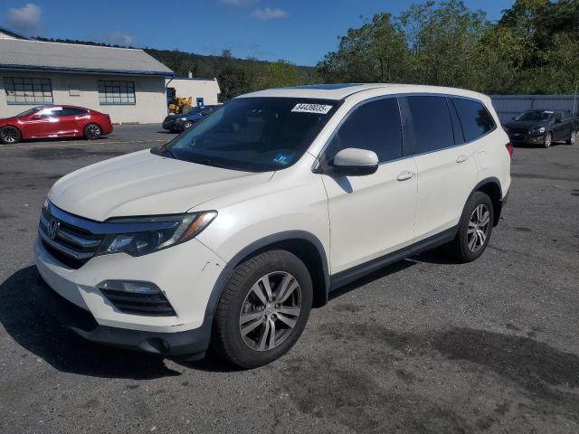 HONDA PILOT EXL 2018 with VIN 5FNYF6H53JB061673 - Photo from auction
