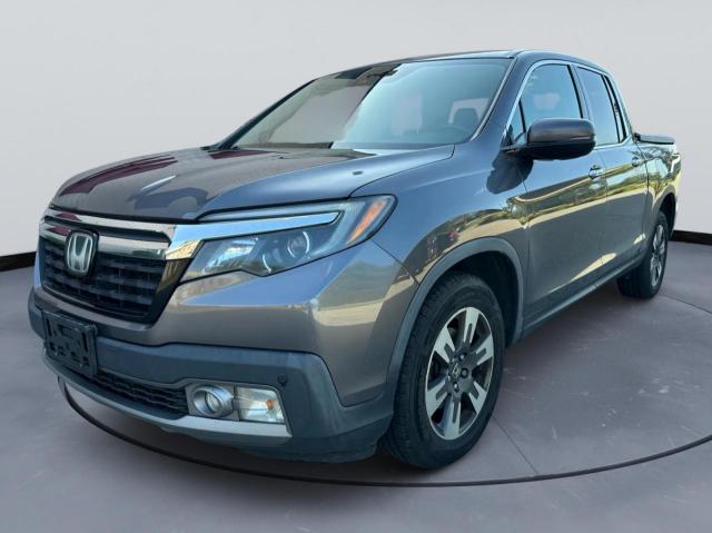 Photo 1 from auction – 2019 HONDA RIDGELINE with VIN 5FPYK3F71KB009532