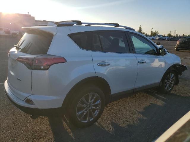 Photo 3 from auction – 2016 TOYOTA RAV4 LIMIT with VIN JTMYFREV6GJ080757