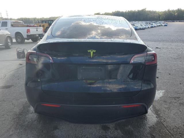 Photo 6 from auction – 2022 TESLA MODEL Y with VIN 7SAYGDEE8NA006695