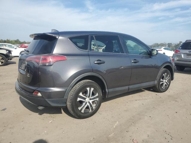 Photo 3 from auction – 2018 TOYOTA RAV4 LE with VIN JTMBFREV2JJ218470