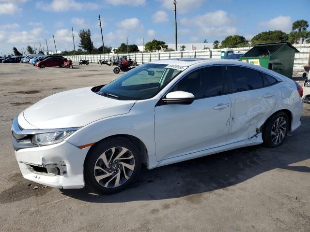 Photo 1 from auction – 2018 HONDA CIVIC EX with VIN 2HGFC2F79JH575780
