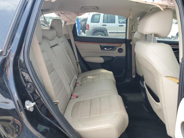 Photo 11 from auction – 2018 HONDA CR-V with VIN 7FARW2H87JE082523