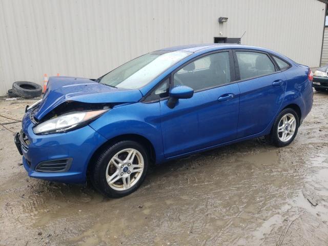 FORD FIESTA SE 2018 with VIN 3FADP4BJ7JM129898 - Photo from auction