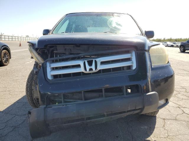Photo 5 from auction – 2006 HONDA PILOT EX with VIN 5FNYF185X6B028082