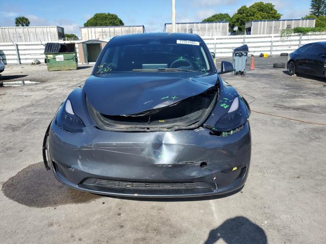 Photo 5 from auction – 2023 TESLA MODEL Y with VIN 7SAYGDEE8PF699998