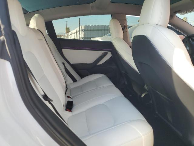 Photo 11 from auction – 2020 TESLA MODEL 3 with VIN 5YJ3E1EA9LF808410