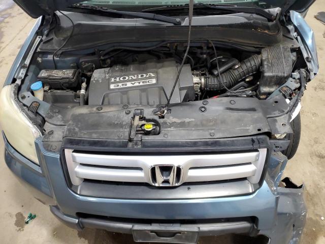 Photo 12 from auction – 2006 HONDA PILOT EX with VIN 2HKYF18486H553778
