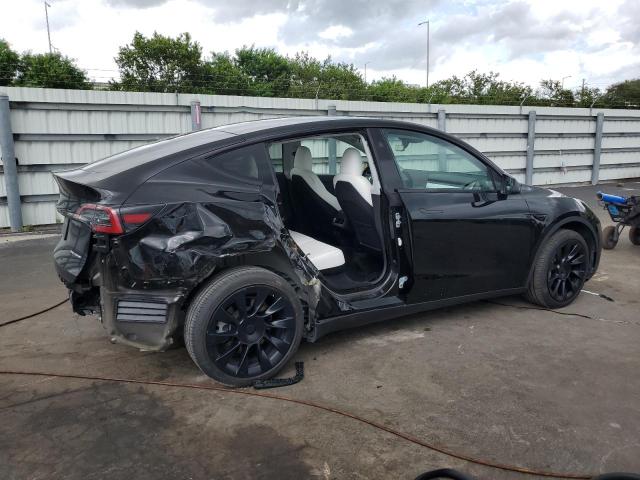 Photo 3 from auction – 2024 TESLA MODEL Y with VIN 7SAYGDEEXRA220836