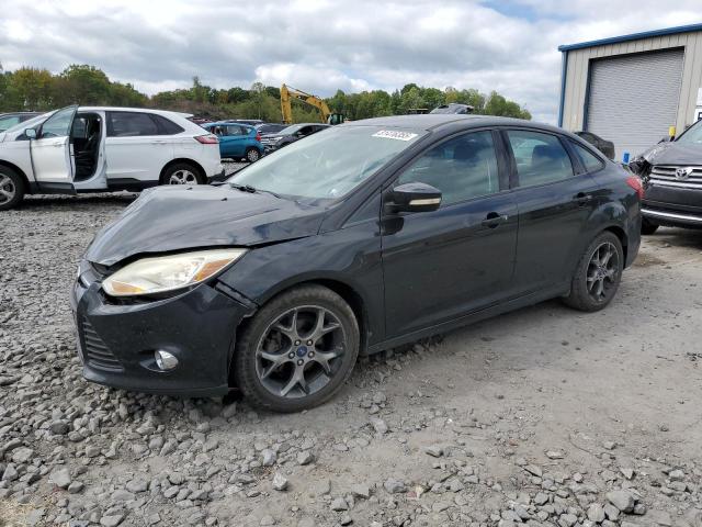 FORD FOCUS SE 2014 with VIN 1FADP3F23EL228383 - Photo from auction