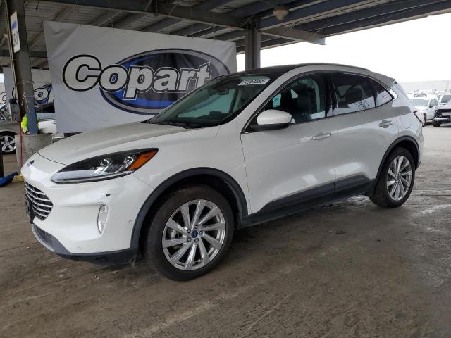 FORD ESCAPE TITANIUM 2021 with VIN 1FMCU9DZ0MUA91831 - Photo from auction