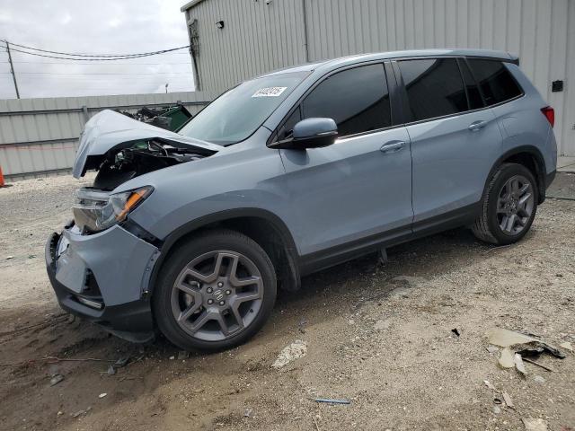 HONDA PASSPORT E 2022 with VIN 5FNYF7H55NB007030 - Photo from auction
