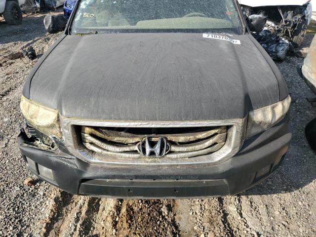 Photo 11 from auction – 2012 HONDA RIDGELINE with VIN 5FPYK1F50CB453117