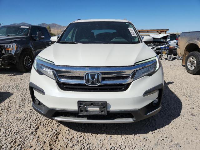 Photo 5 from auction – 2019 HONDA PILOT ELIT with VIN 5FNYF6H06KB075430