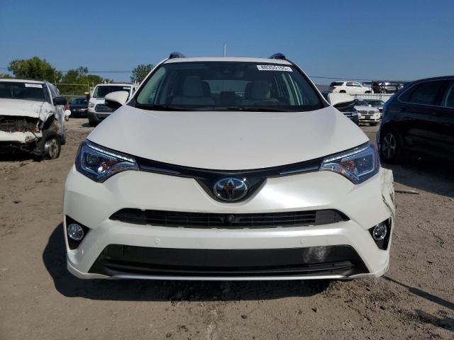 Photo 5 from auction – 2018 TOYOTA RAV4 LIMITED with VIN 2T3DFREV7JW850097