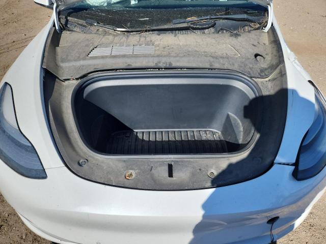 Photo 11 from auction – 2021 TESLA MODEL Y with VIN 5YJYGDEE5MF161557