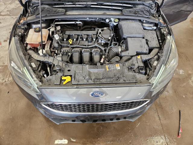 Photo 11 from auction – 2015 FORD FOCUS SE with VIN 1FADP3K26FL254712