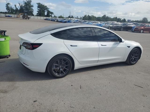 Photo 3 from auction – 2021 TESLA MODEL 3 with VIN 5YJ3E1EA6MF913357