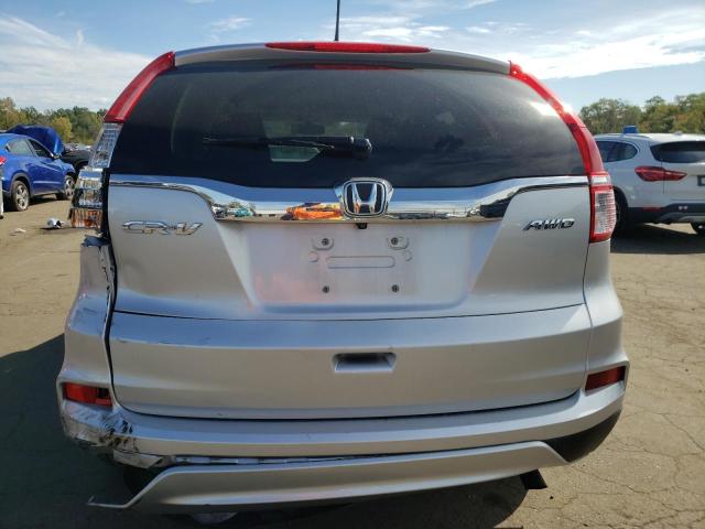 Photo 6 from auction – 2015 HONDA CR-V EX with VIN 2HKRM4H57FH698640