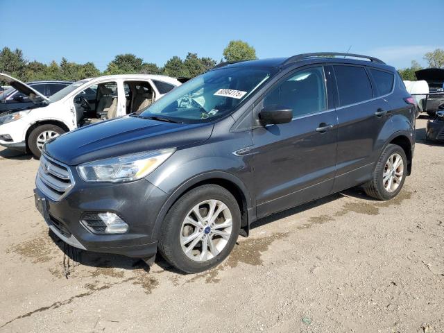 FORD ESCAPE SE 2018 with VIN 1FMCU0GD7JUB85471 - Photo from auction