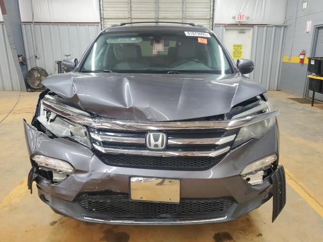 Photo 5 from auction – 2016 HONDA PILOT TOUR with VIN 5FNYF5H99GB003363