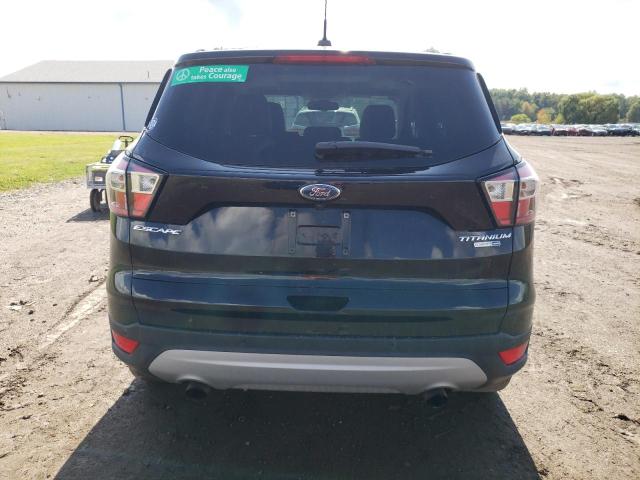 Photo 6 from auction – 2017 FORD ESCAPE TIT with VIN 1FMCU9JD7HUC77588